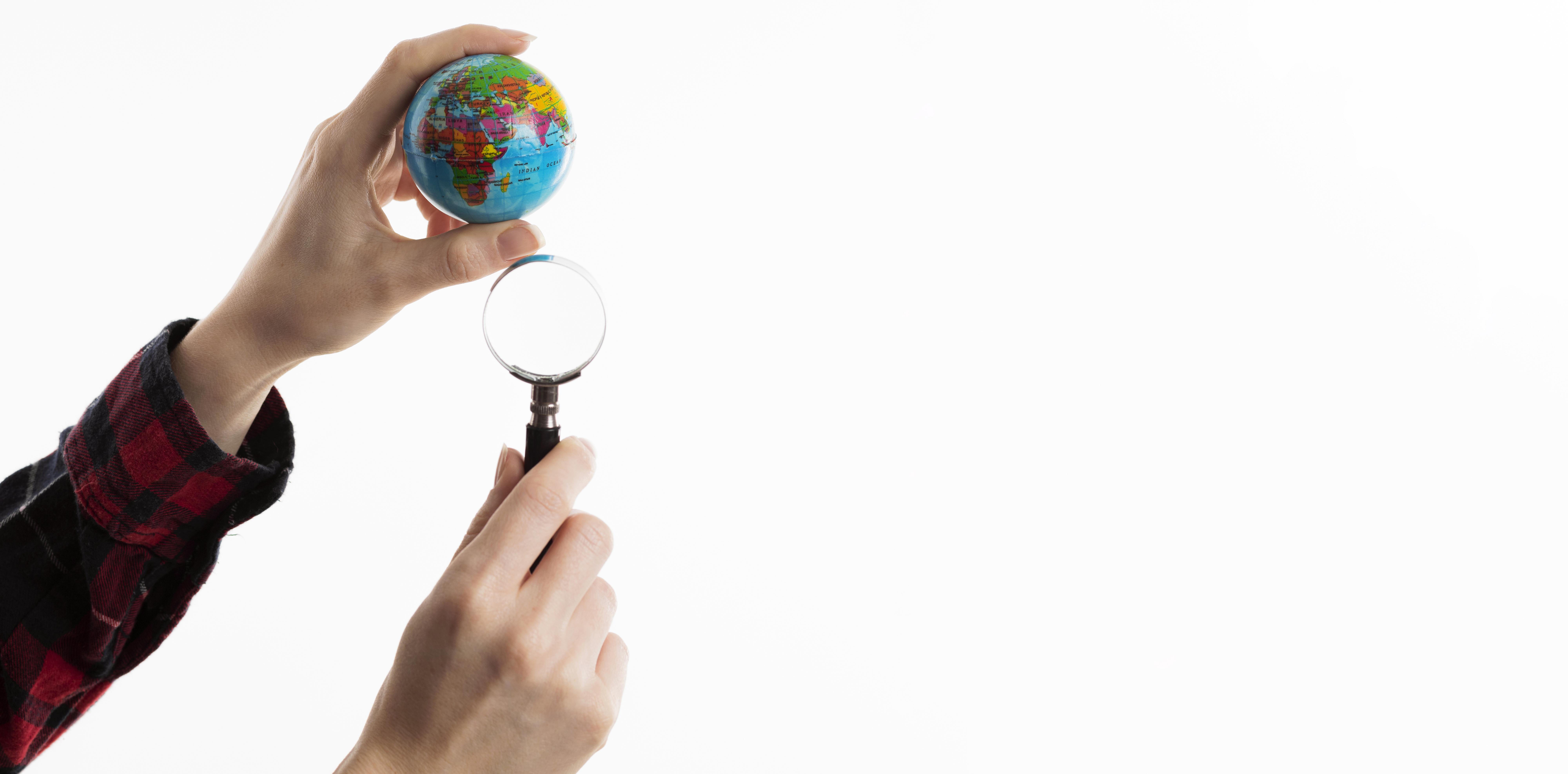 hands-holding-globe-binoculars.jpg